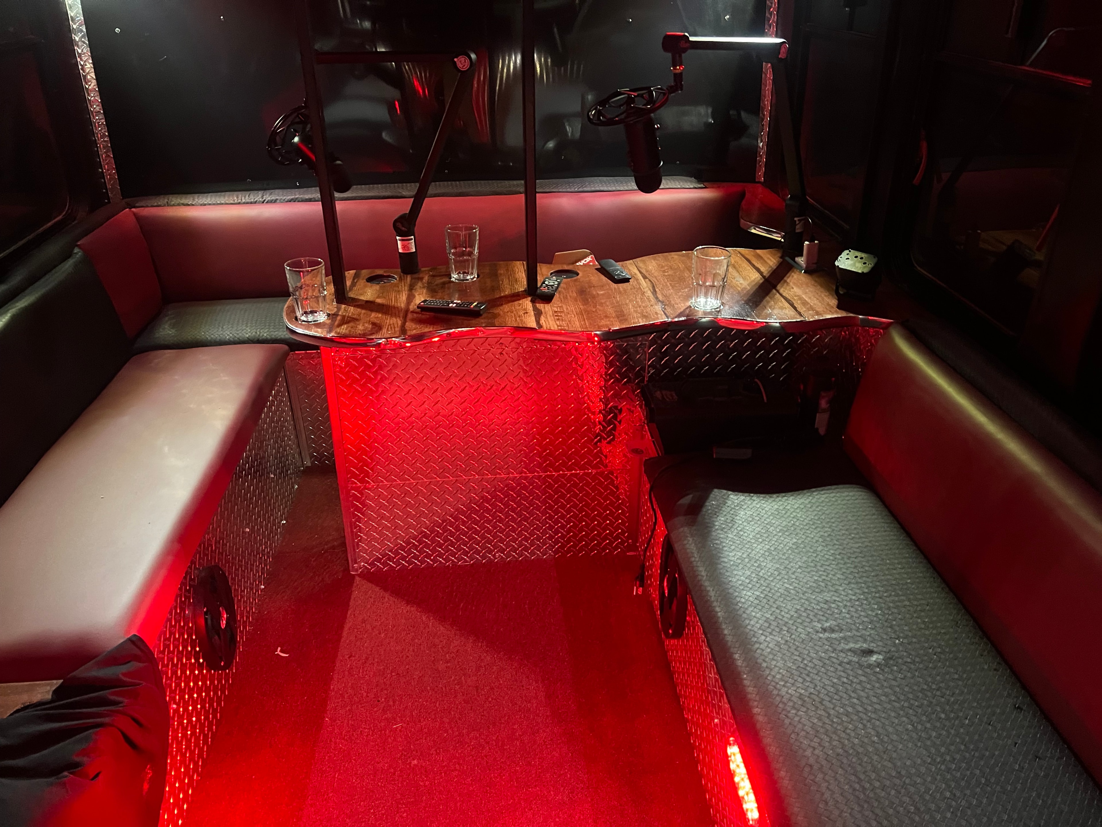Mobile studio interior podcast setup with neon lighting